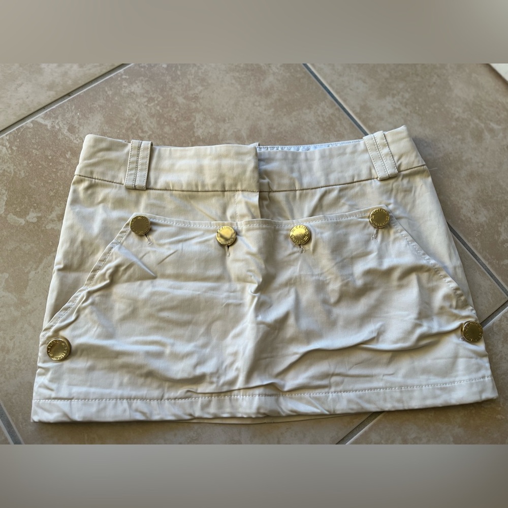 CELYN B Made In Italy Stylish Cream Mini Skirt with Gold Buttons